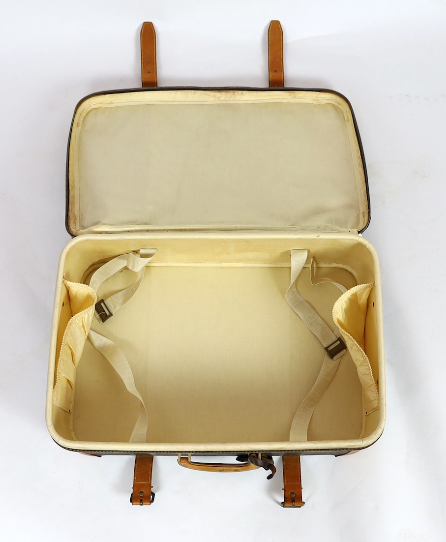 A 1980/90s Louis Vuitton canvas monogram suitcase, 59cm wide, 46cm deep, 23cm high